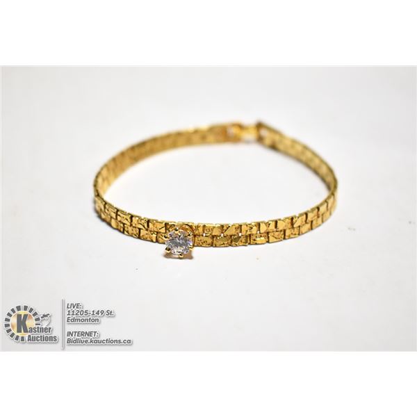 GOLD TONED BRACELET WITH RHINESTONE INLAY