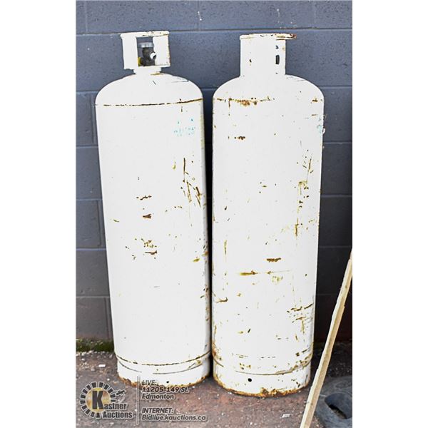 *OUT SIDE BY HANDOUT ROOM* TWO LARGE PROPANE TANKS