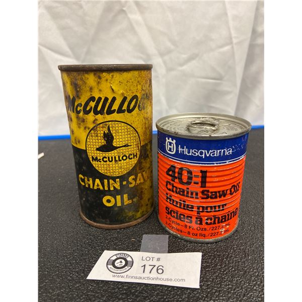 Husqvarna Full Chain Saw Oil Tin and an Empty McCulloon Chain Saw Oil Tin