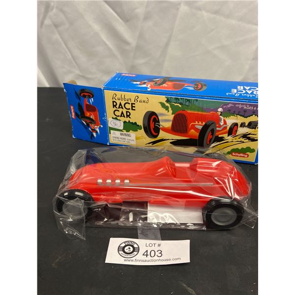 Rubber Band Race Car in Box. Nice Graphics