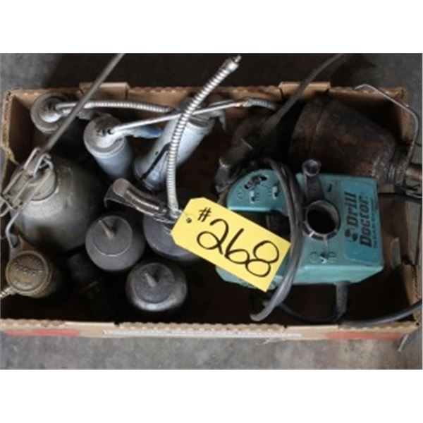 BOX WITH DRILL BIT SHARPENER, GREASE GUNS, APPROX 9 VINTAGE OIL CANS