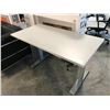 Image 1 : GREY 4'X2' ELECTRIC SIT/STAND PROGRAMMERS TABLE , HEIGHT ADJUSTMENT FROM 71CM TO 118CM