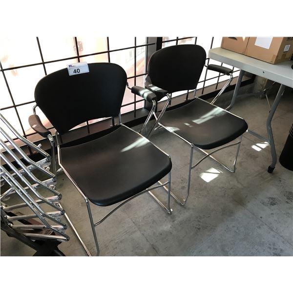 8 BLACK AND CHROME FRAME STACKING ARM CHAIRS COMES WITH CHAIR DOLLIE