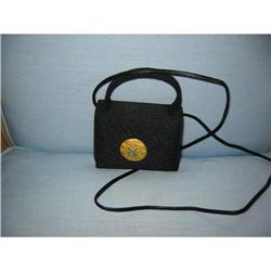 a black fabric hand bag w two handles decorated#1888631