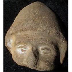 Ancient stone carving of Dioscurus head #1914788