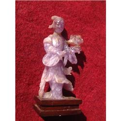 Antique amethyst carving featuring Guan Yin #1914880