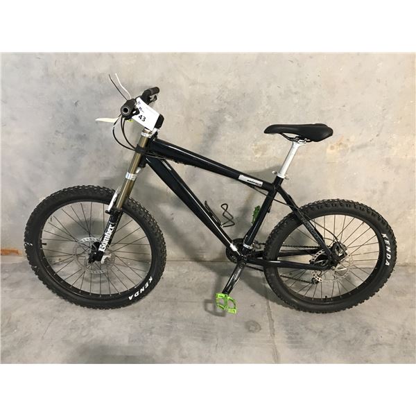 BLACK NORCO RAMPAGE 21 SPEED, 17" FRAME, DISC BRAKE, FRONT SUSPENSION MOUNTAIN BIKE-NO FRONT BRAKES