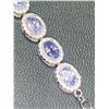 Image 3 : Natural Tanzanite Tennis Bracelet with 10.45 CARAT weight of stones set in .925 Silver with appraisa