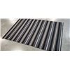 Image 1 : 5.5' by 4' outdoor area rug