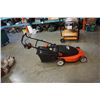 Image 1 : Black and Decker cordless lawn mower with safety key and charger working