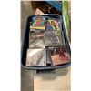 Image 2 : Tote of music CDs and box of cassette movies