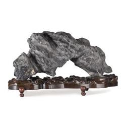 Spirit stone with wooden base