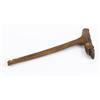 A plainly carved wooden Maori adze