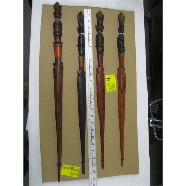 BOARD OF 4 DECORATIVE CARVED WOODEN SPEARS