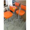 Image 2 : SET OF 3 ORANGE SWIVEL TOP STOOLS
