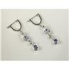 Image 1 : TANZANITE AND DIAMOND DANGLE EARRINGS IN 14K GOLD