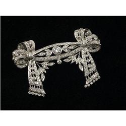 DIAMOND AND 18K WHITE GOLD RIBBON FORM BROOCH
