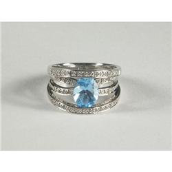 BLUE TOPAZ AND DIAMOND LADY'S RING IN 14K