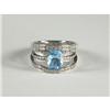 Image 1 : BLUE TOPAZ AND DIAMOND LADY'S RING IN 14K