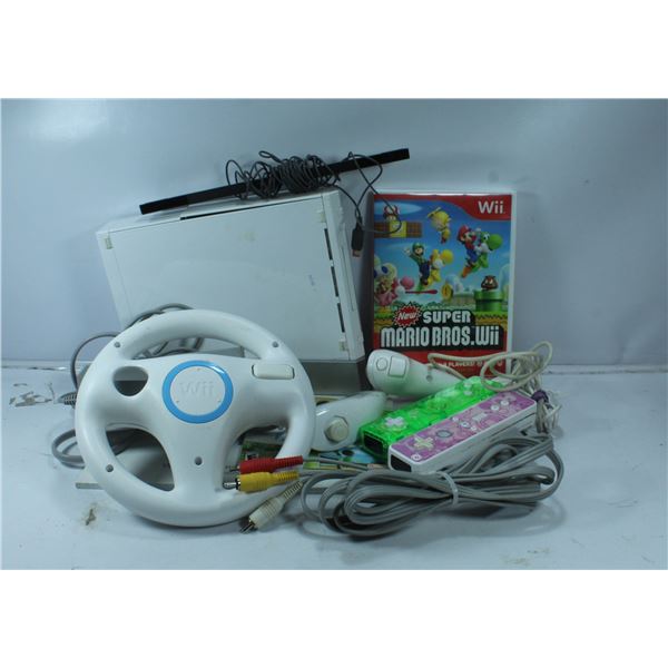 NINTENDO WII CONSOLE WITH 4 REMOTES, CORDS