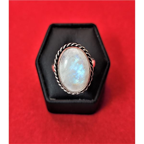 11)  OVAL MOONSTONE RING WITH ROPE DESIGN