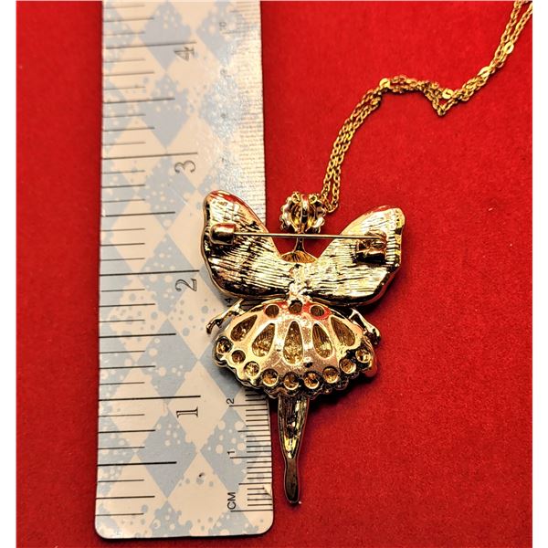 9)  FROM DESIGNER BETSEY JOHNSON, GOLD TONE