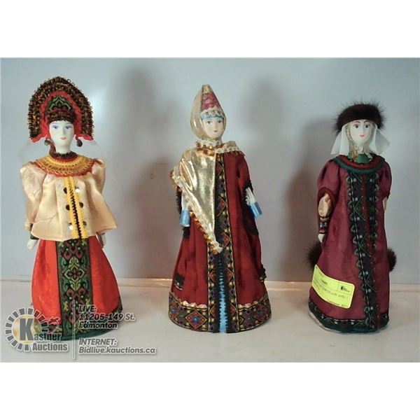 2 RUSSIAN LADY PORCELAIN AND 1 PAPER DOLLS