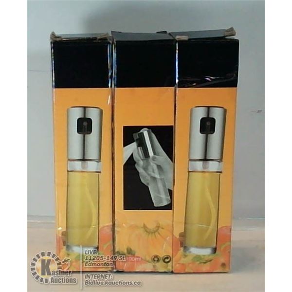 LOT OF THREE GLASS VINEGAR/OIL SPRAYERS.