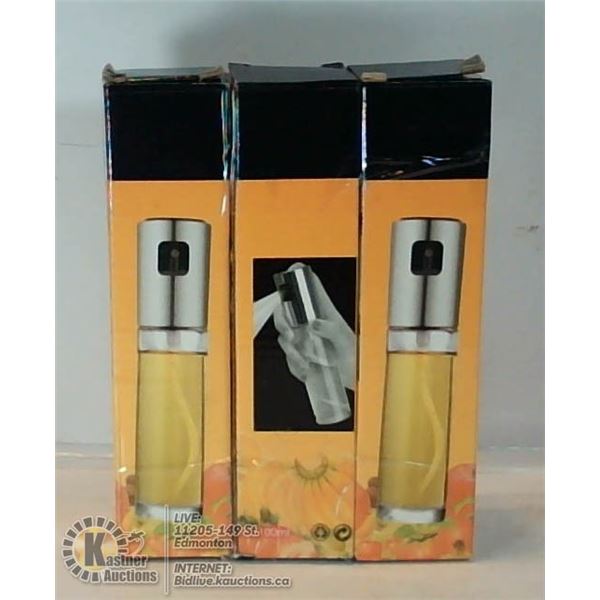 LOT OF THREE GLASS VINEGAR/OIL SPRAYERS.