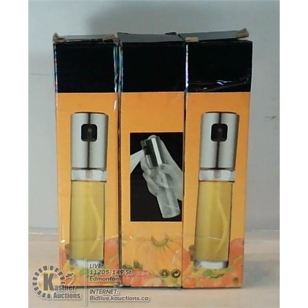LOT OF THREE GLASS VINEGAR/OIL SPRAYERS.