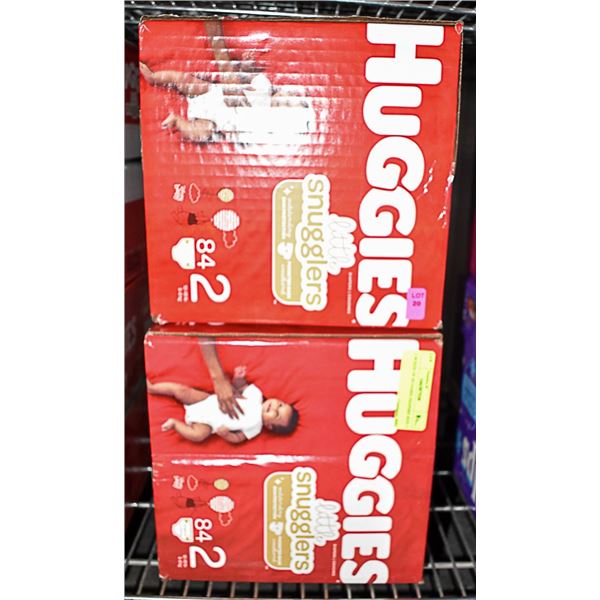 2 BOXES OF HUGGIES DIAPERS SIZE 2