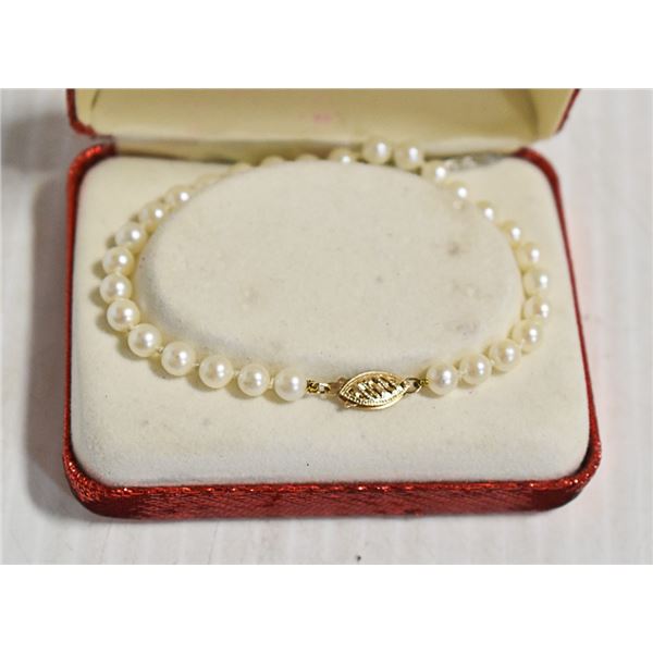 ESTATE NATURAL PEARL BRACELET WITH 14 KT GOLD
