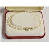 Image 1 : ESTATE NATURAL PEARL BRACELET WITH 14 KT GOLD
