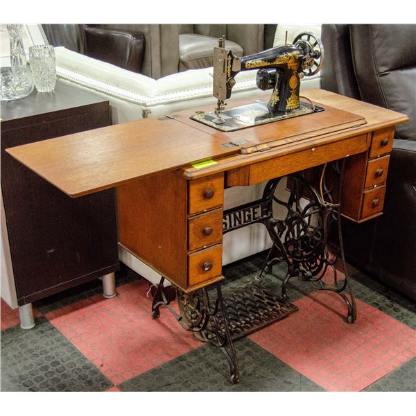 ANTIQUE SINGER TREDDLE SEWING MACHINE IN CABINET