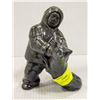 Image 1 : INUIT CARVING INUIT PLAYING WITH DOG