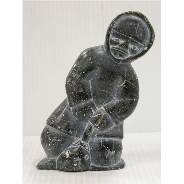 INUIT CARVING HUNTER AND SEAL