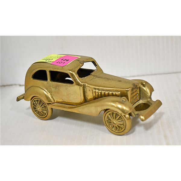 VINTAGE SOLID BRASS CAR WITH ROLLING TIRES