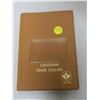 Image 1 : Unisafe Canadian Trade Dollar book. Holds 60 Trade Dollars. Near new condition.