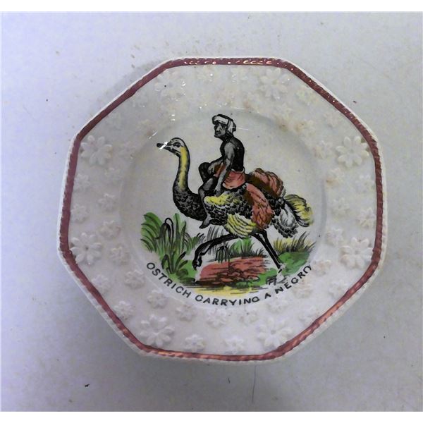Antique "Osterich Carying a Negro" tea saucer dish