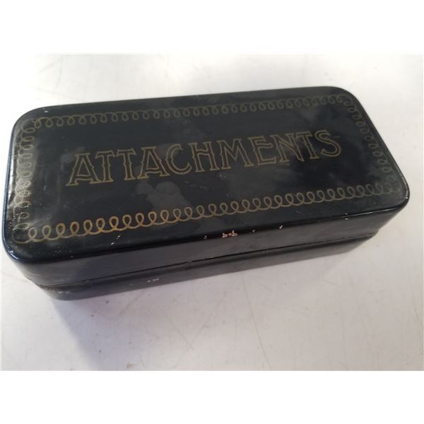 Antique sewing accessories tin full of sewing machine parts