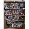 Image 1 : Shelf with Various DVDs Included