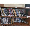 Image 2 : Shelf with Various DVDs Included