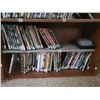 Image 4 : Shelf with Various DVDs Included