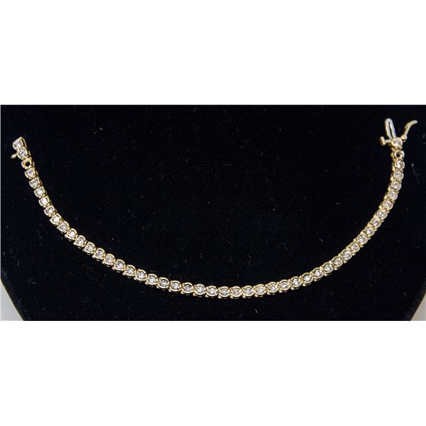 14K GOLD TENNIS BRACELET WITH CLEAR STONES,