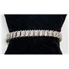 Image 1 : 10K WHITE GOLD TENNIS BRACELET WITH CLEAR STONES,