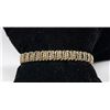 Image 1 : 10K YELLOW GOLD TENNIS BRACELET WITH CLEAR STONES,