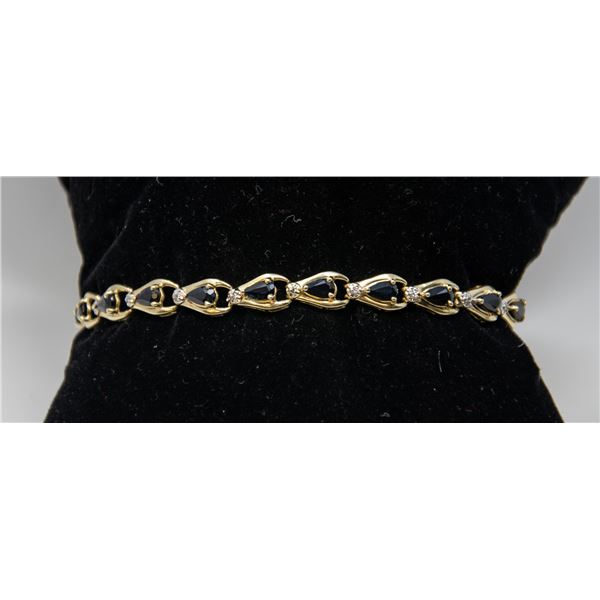 14K WHITE GOLD BRACELET WITH BLACK STONES,