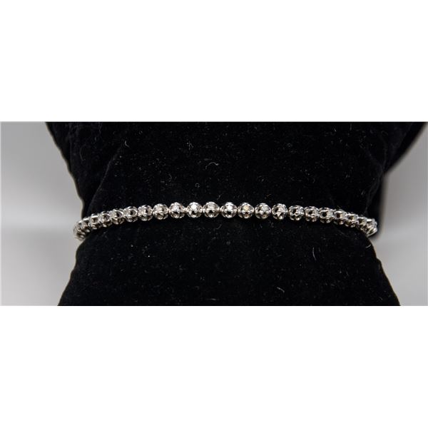 14K WHITE GOLD TENNIS BRACELET WITH CLEAR STONES,