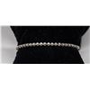 Image 1 : 14K WHITE GOLD TENNIS BRACELET WITH CLEAR STONES,