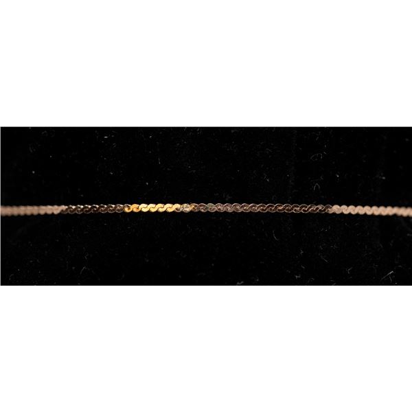 10K GOLD FLAT CURB CHAIN BRACELET, APPROX. 7 IN.